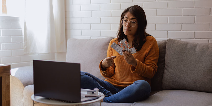 A Woman Researching The Truth About Getting the Abortion Pill Through Telehealth